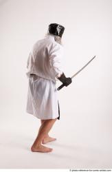 Man Adult Chubby White Fighting with knife Standing poses Coat